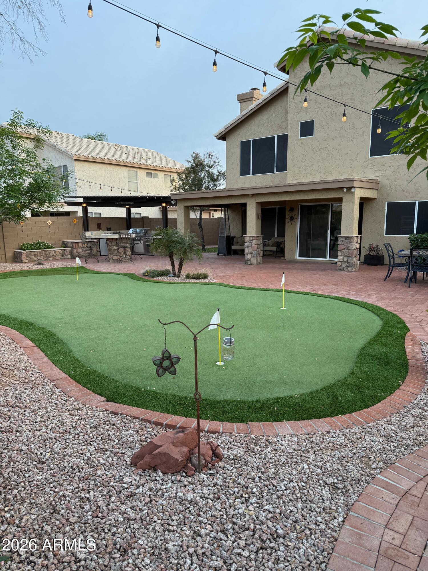 3426 East Clark Road Phoenix, AZ 85050 - Photo 46 of 48 a view of a swimming pool with a patio