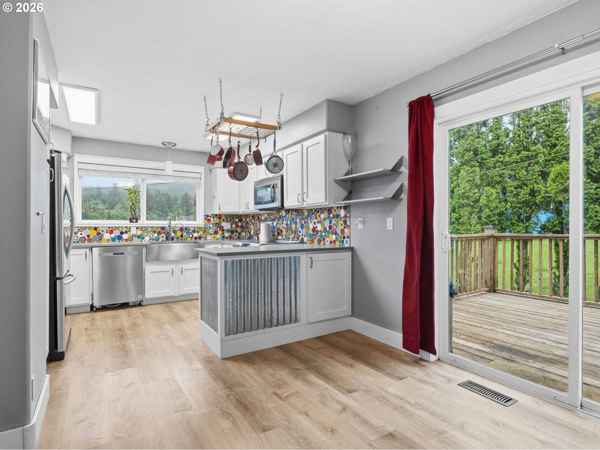 92085 Akerstedt Road Astoria, OR 97103 - Photo 11 of 48 a kitchen with stove and cabinets