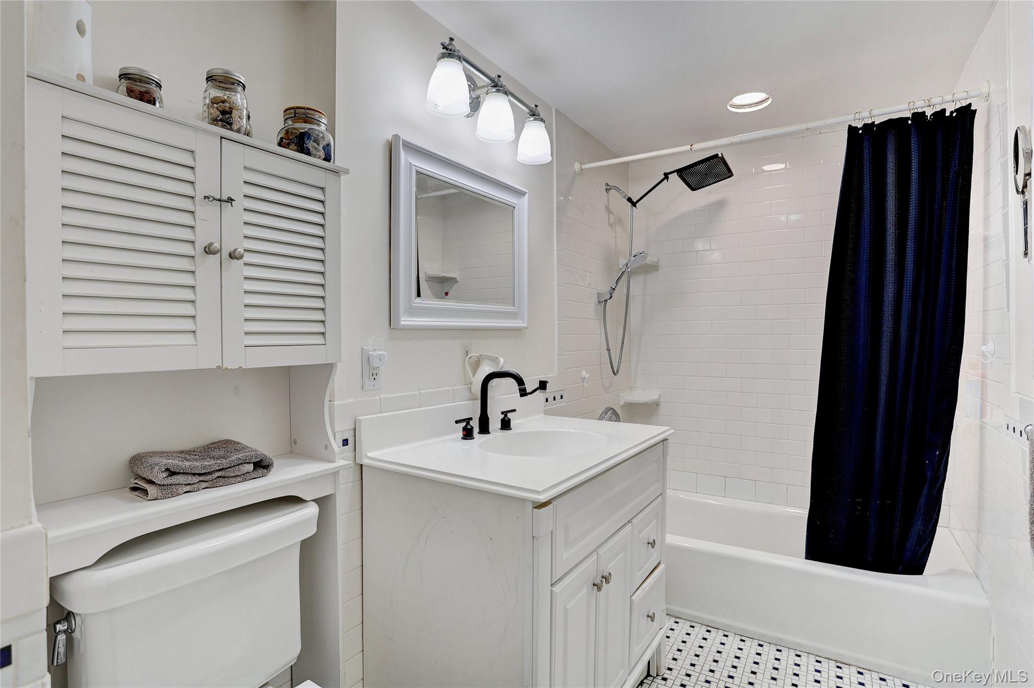 35 Regina Road Monsey, NY 10952 - Photo 30 of 34 Full bathroom with vanity, shower / bath combo with shower curtain, and recessed lighting