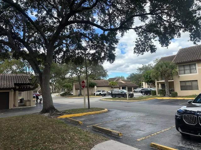 a building with trees in front of it