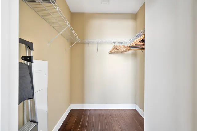 a bathroom with a glass door shower a sink and a bathtub