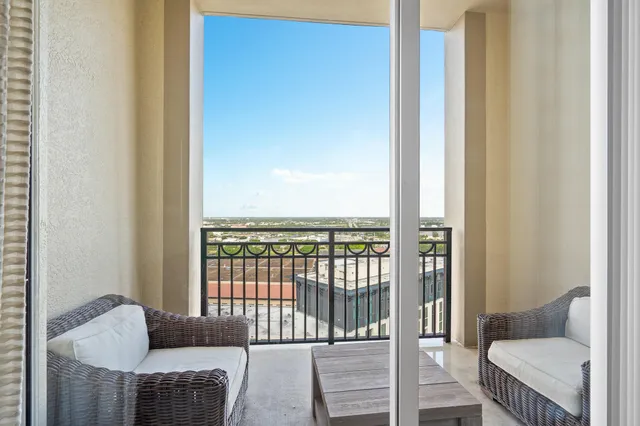 a view of a balcony with an ocean
