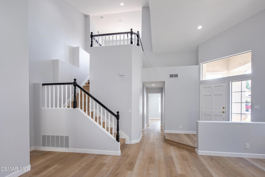 4774 Rhapsody Drive Oak Park, CA 91377 - Photo 13 of 34 a view of an entryway with wooden floor