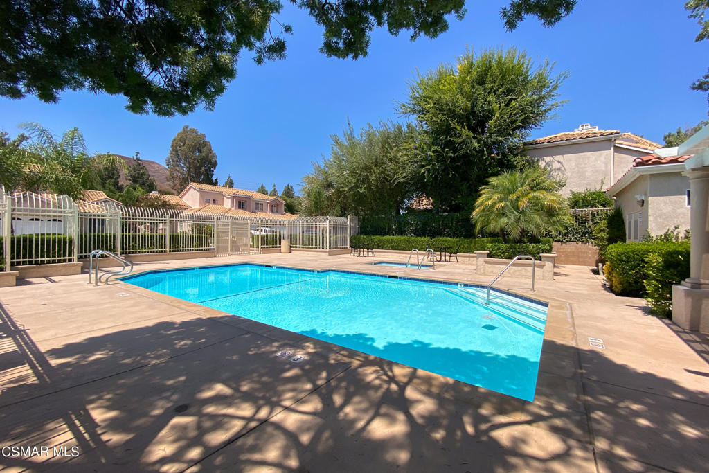 4774 Rhapsody Drive Oak Park, CA 91377 - Photo 33 of 34 a view of outdoor space with swimming pool and yard