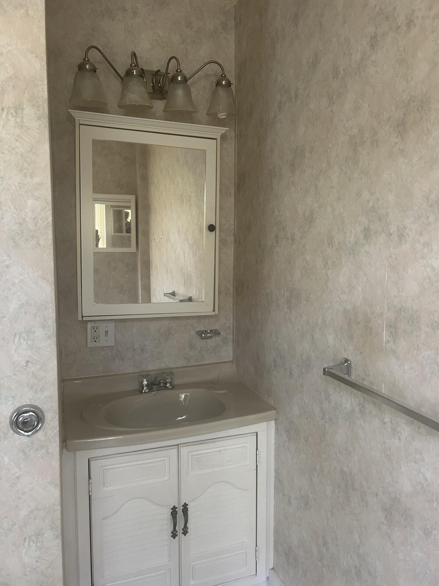 26 Bemis Street Livermore Falls, ME 04254 - Photo 20 of 22 0412 bathroom sink area