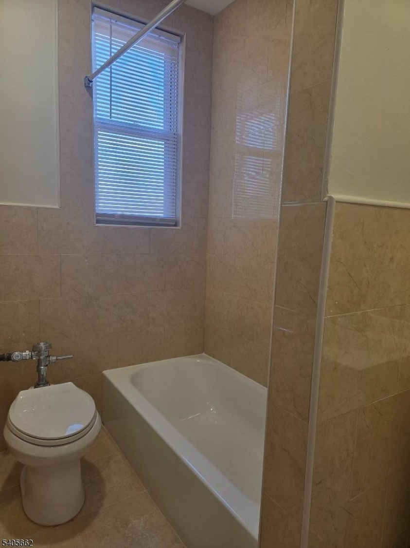 80 Union Avenue, Unit C6 Clifton, NJ 07011 - Photo 6 of 9 a bathroom with a toilet and a bathtub