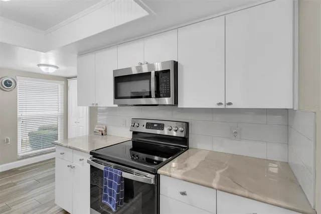 a bathroom with a sink a toilet and a bathtub