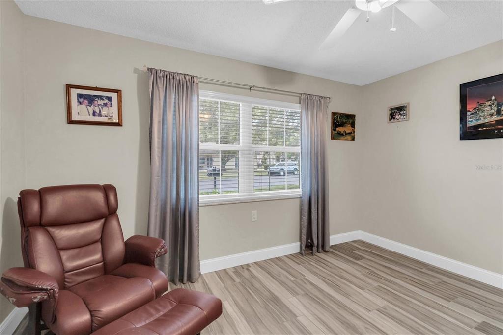 4638 Sheffield Drive New Port Richey, FL 34655 - Photo 23 of 67 a room with furniture and a window