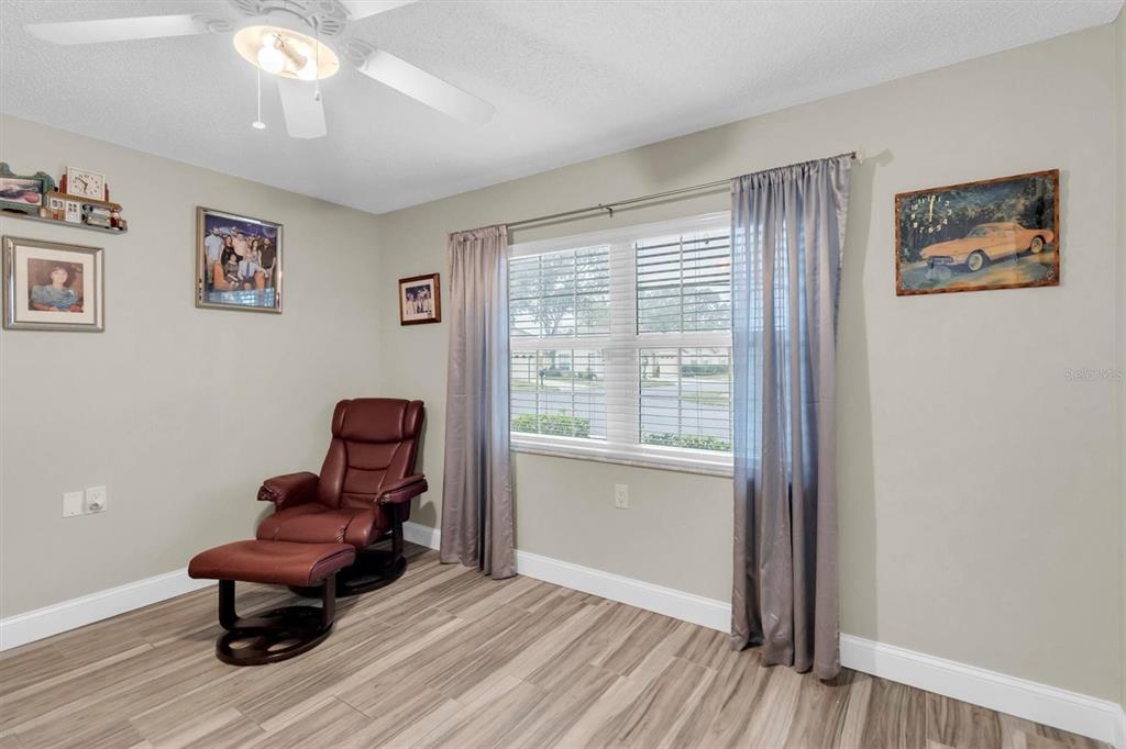 4638 Sheffield Drive New Port Richey, FL 34655 - Photo 25 of 67 a living room with furniture and a window