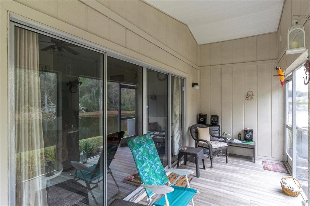4638 Sheffield Drive New Port Richey, FL 34655 - Photo 27 of 67 a living room with furniture