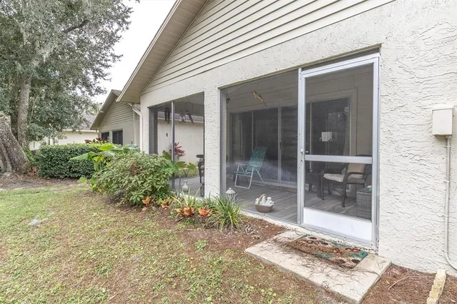 a view of a house with garden and yard