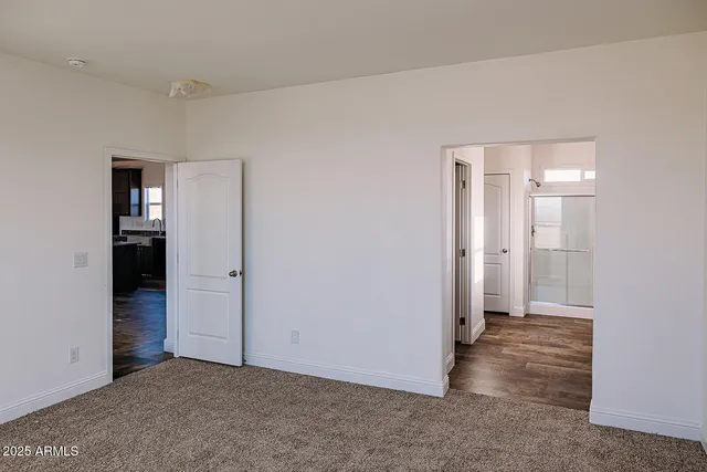 a kitchen with a refrigerator and window