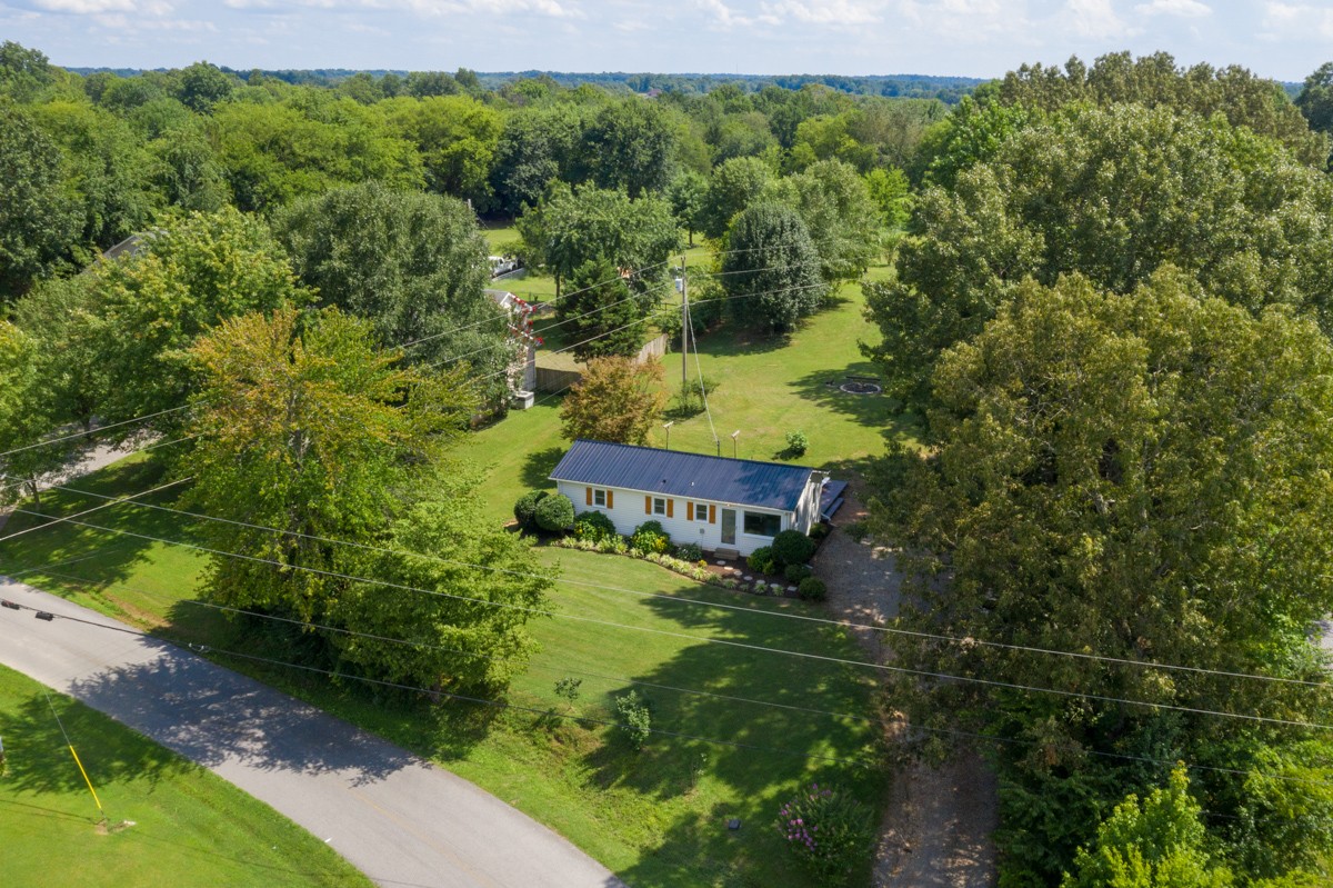 341 Lee Road Cottontown, TN 37048 - Photo 1 of 43 a view of a house with a yard