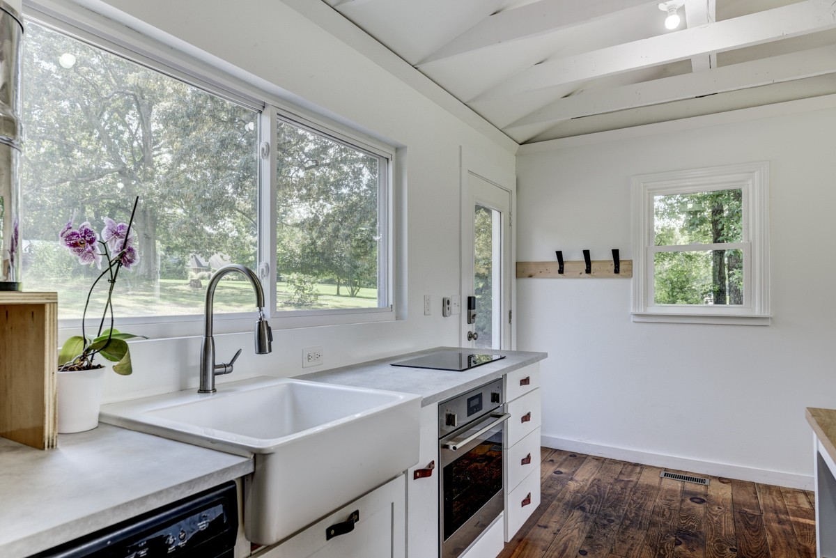 341 Lee Road Cottontown, TN 37048 - Photo 14 of 43 a kitchen with a sink and large window