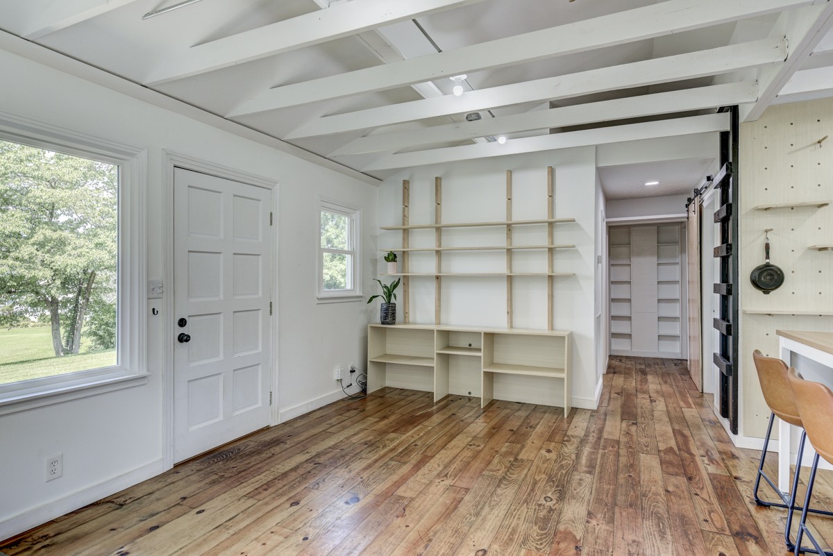 341 Lee Road Cottontown, TN 37048 - Photo 16 of 43 a view of a walk in closet and wooden floor