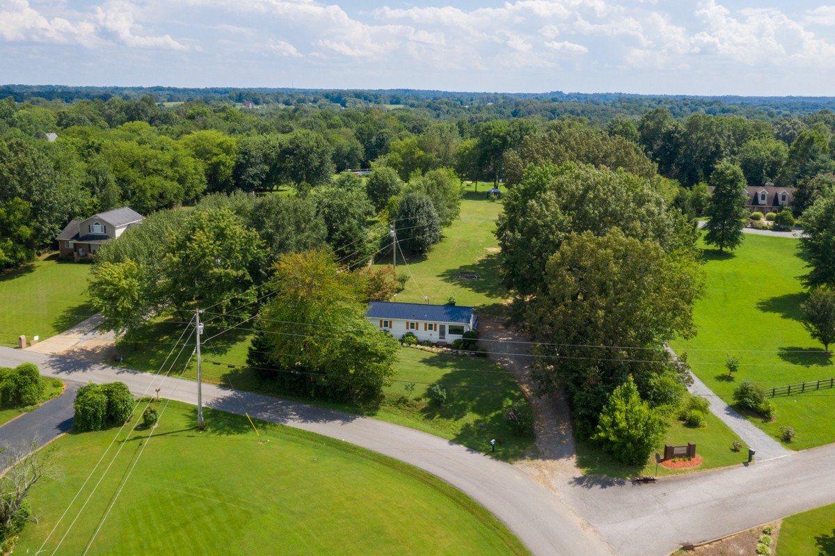 341 Lee Road Cottontown, TN 37048 - Photo 2 of 43 an aerial view of a houses with a yard