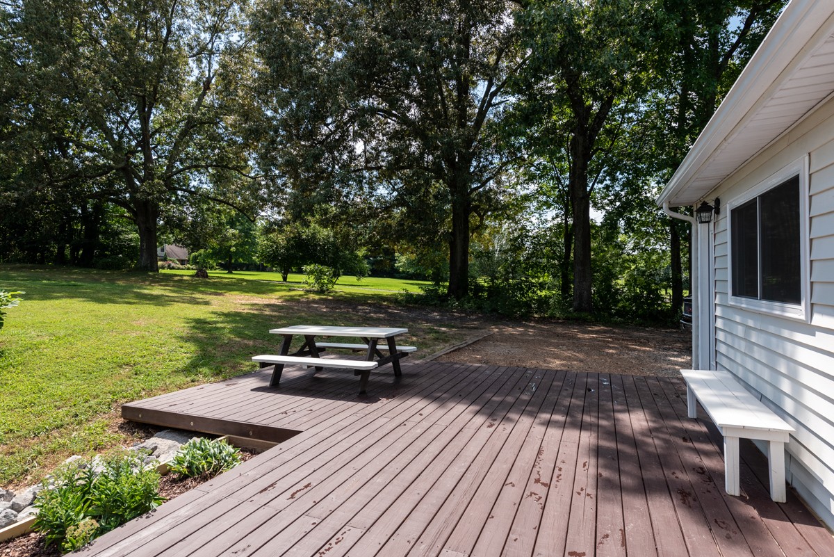 341 Lee Road Cottontown, TN 37048 - Photo 31 of 43 a view of a backyard with sitting area