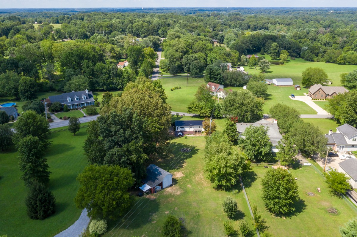 341 Lee Road Cottontown, TN 37048 - Photo 38 of 43 an aerial view of a houses with a yard