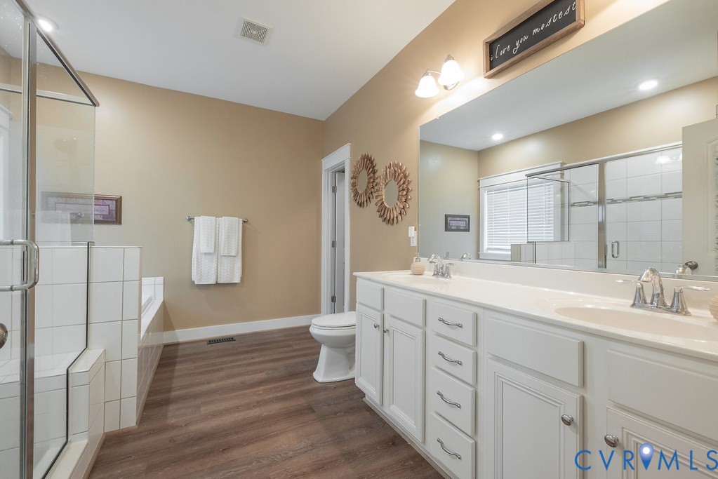6446 Chestnut Church Road Mechanicsville, VA 23116 - Photo 22 of 49 Bathroom featuring a dual vanity with white cabine