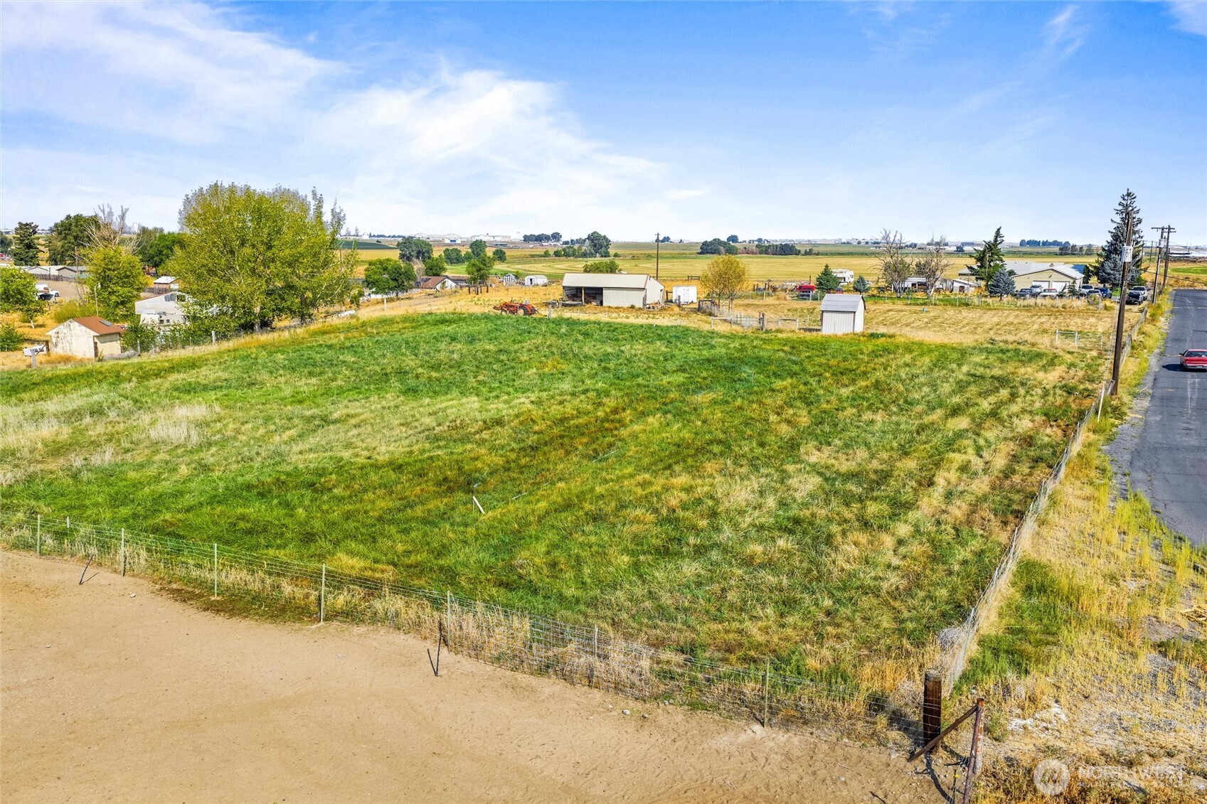 9749 Harris Road Northeast Moses Lake, WA 98837 - Photo 15 of 25 a view of a yard with an outdoor space
