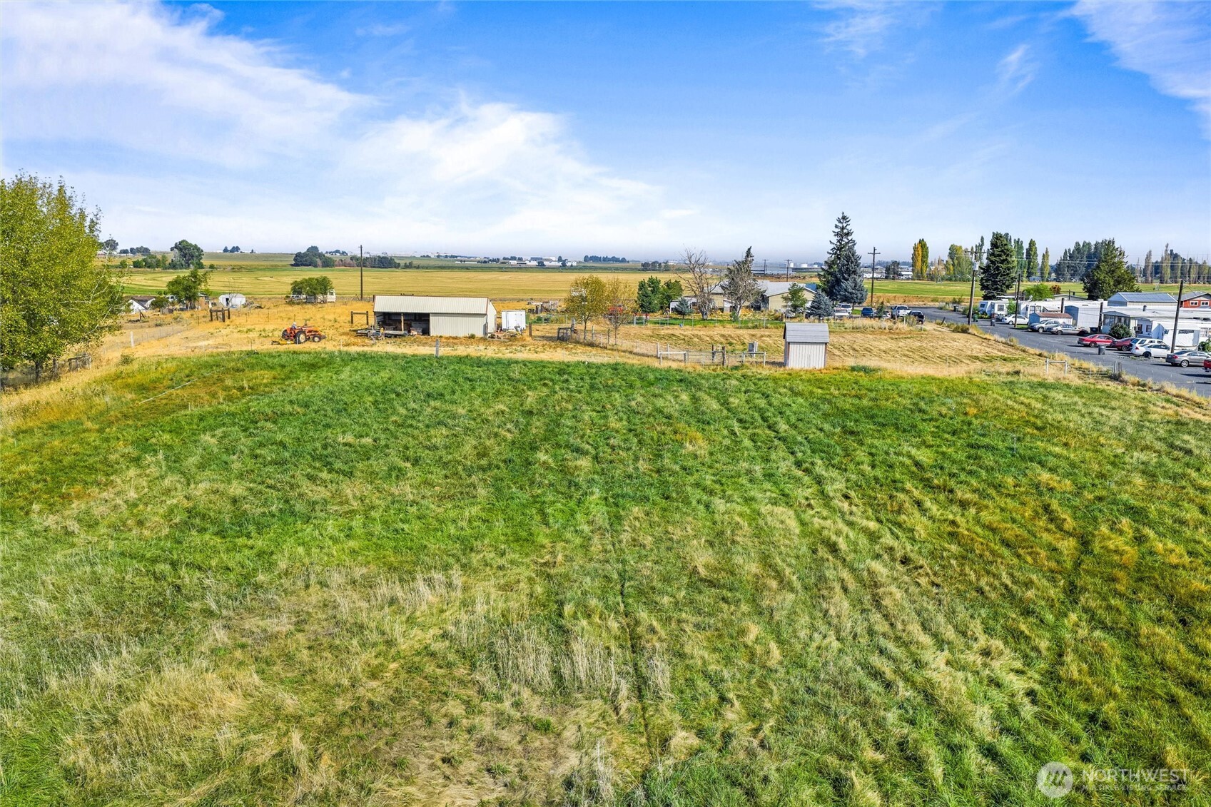 9749 Harris Road Northeast Moses Lake, WA 98837 - Photo 20 of 25 a view of a lake with houses in the back