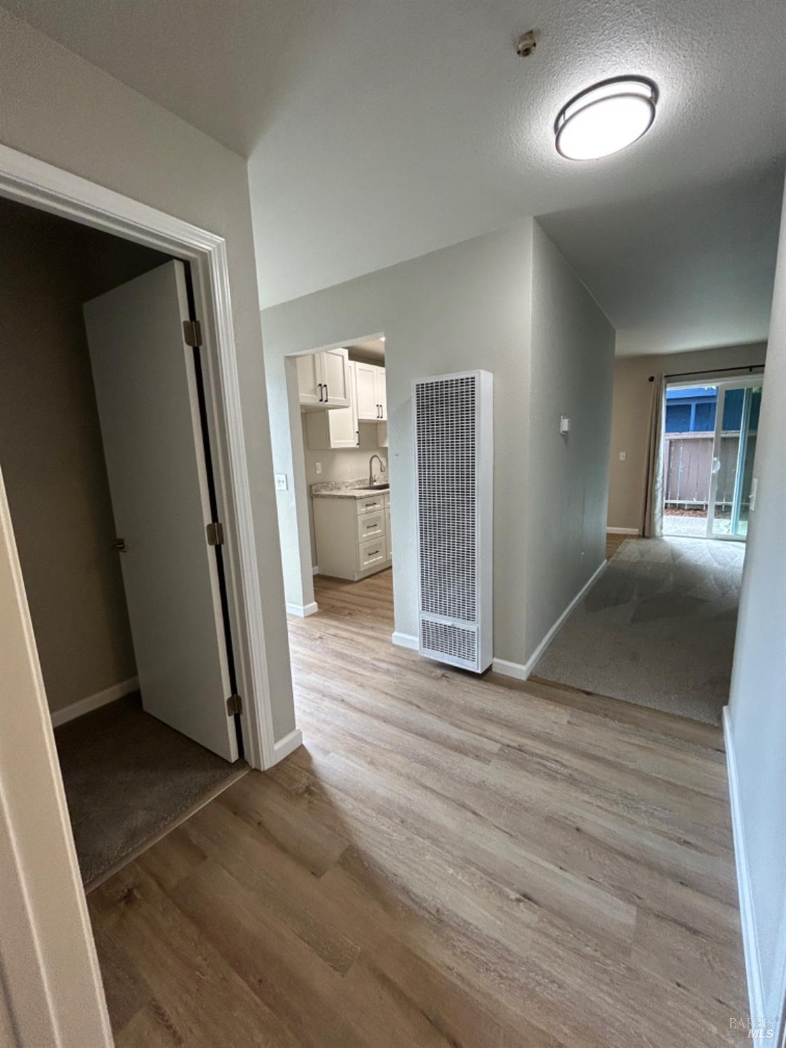 2829 Apple Valley Lane Santa Rosa, CA 95403 - Photo 14 of 14 Living room and bedrooms all separated by LVP allow for replacement of carpet separately when each room may need rather than having to replace all at the same time.