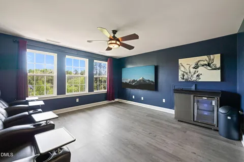 a view of balcony with wooden floor