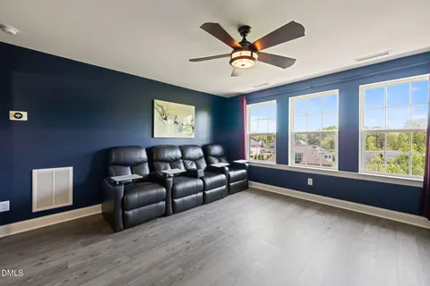a view of balcony with wooden floor
