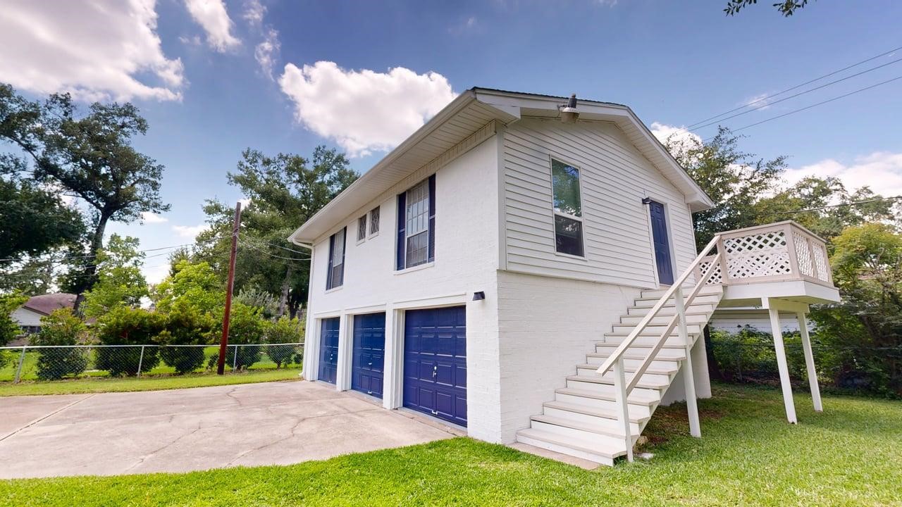 619 Cotter Drive Spring, TX 77373 - Photo 5 of 50 a view of a house with a yard and furniture