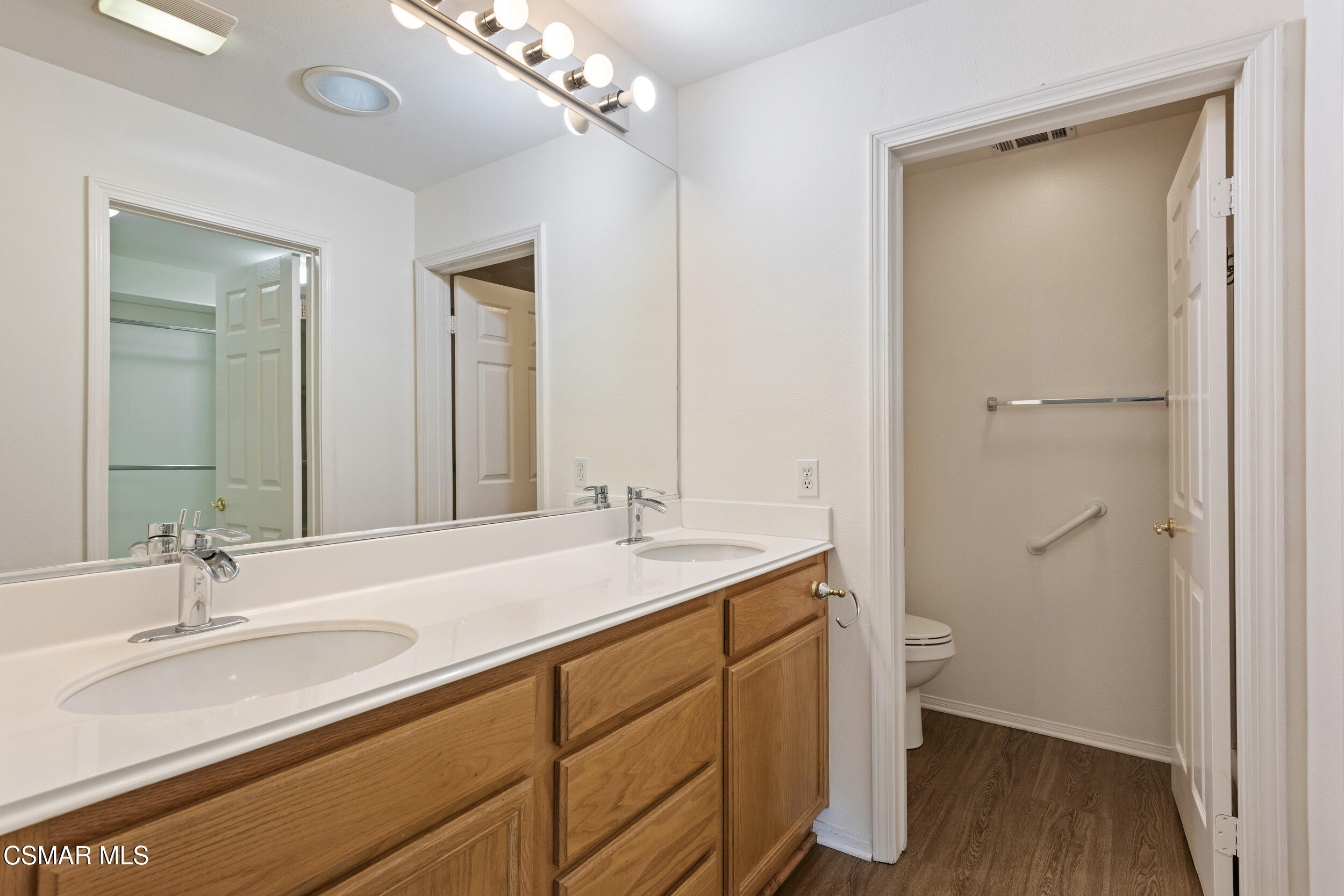2059 Tulip Avenue Simi Valley, CA 93063 - Photo 15 of 37 a bathroom with a sink and a mirror