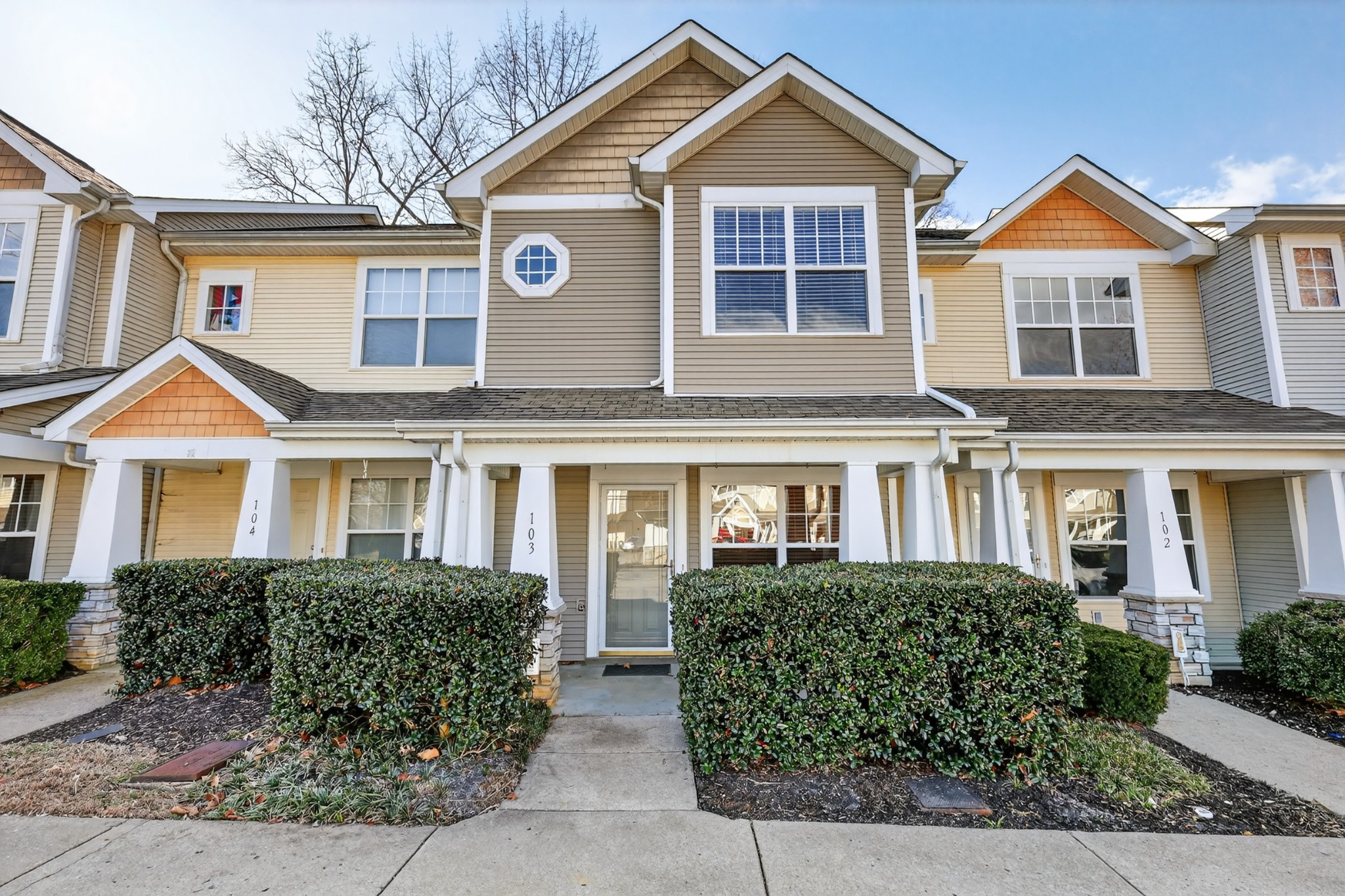 3535 Bell Road, Unit 103 Nashville, TN 37214 - Photo 3 of 29 a front view of a house with garden