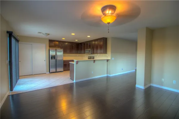 a view of a kitchen with a sink and a microwave