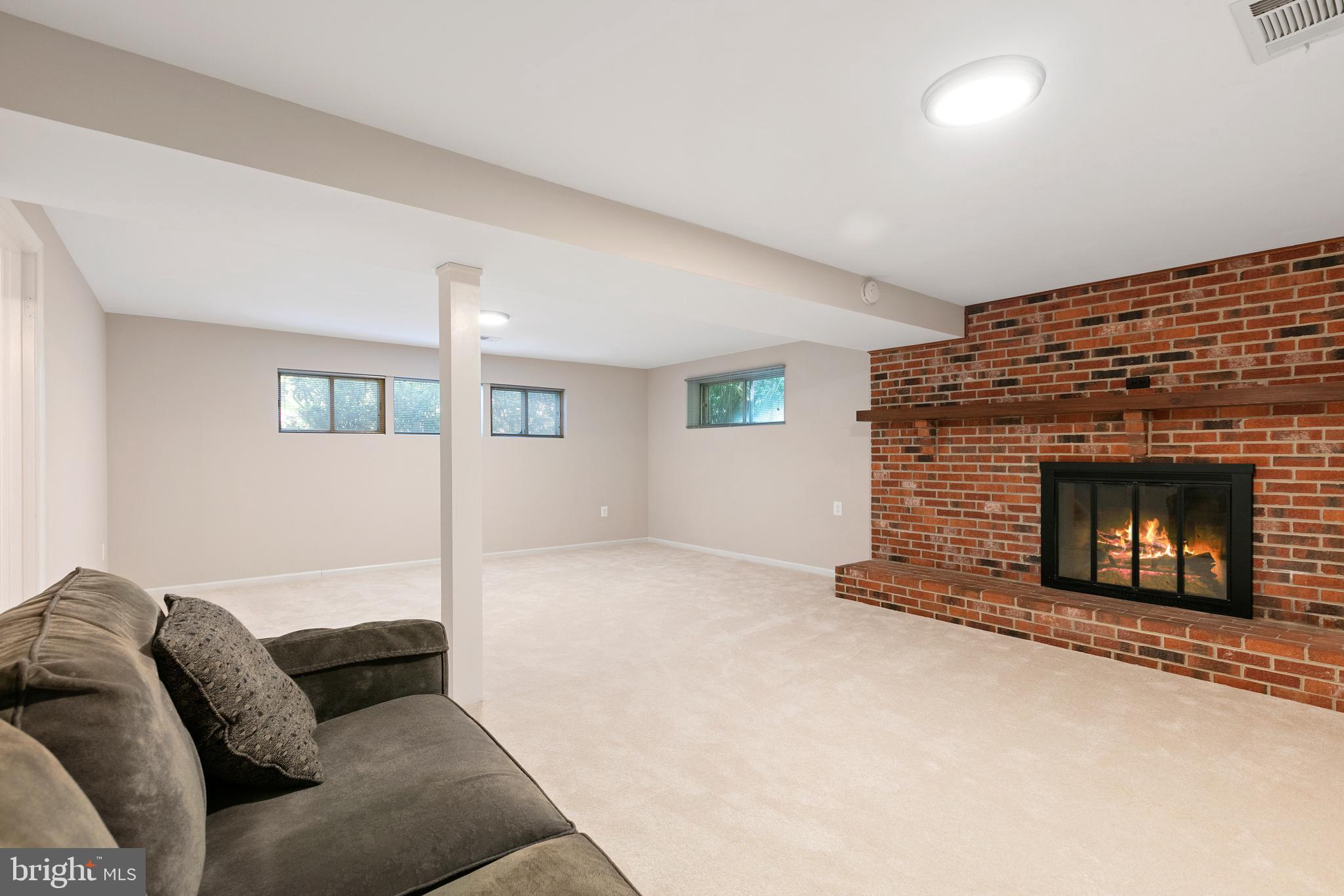 5505 Eastbourne Drive Springfield, VA 22151 - Photo 7 of 64 Lower lvl rec rm w/wood fireplace and new carpet