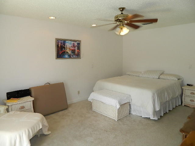 4604 Brandywine Drive Boca Raton, FL 33487 - Photo 15 of 25 MASTER BEDROOM OVERLOOKS POOL