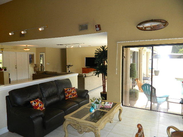 4604 Brandywine Drive Boca Raton, FL 33487 - Photo 22 of 25 FAMILY ROOM OVERLOOKING POOL