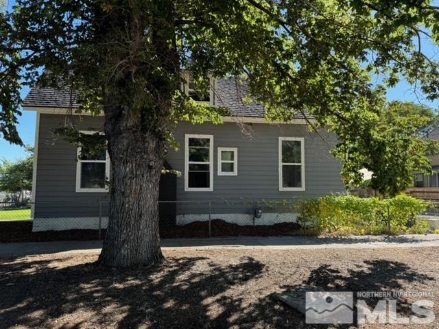 606 East 7th Street Reno, NV 89512 - Photo 2 of 35 a front view of a house with garden