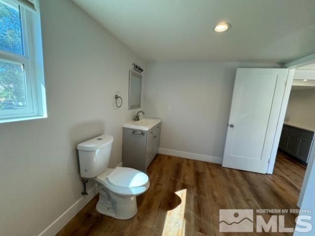 606 East 7th Street Reno, NV 89512 - Photo 29 of 35 a white toilet sitting next to a bathroom sink