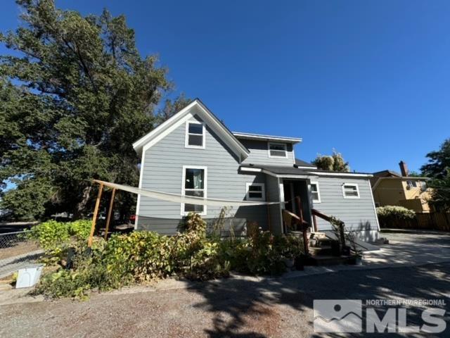 606 East 7th Street Reno, NV 89512 - Photo 5 of 35 a front view of a house with garden