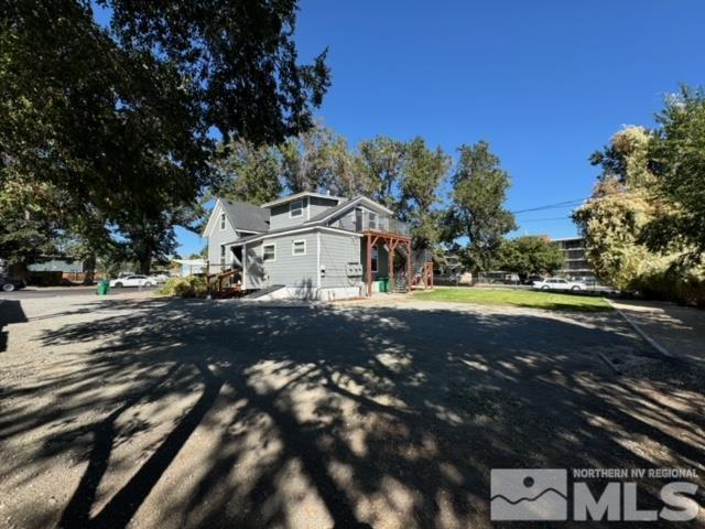 606 East 7th Street Reno, NV 89512 - Photo 6 of 35 a view of yard with cars parked on the road