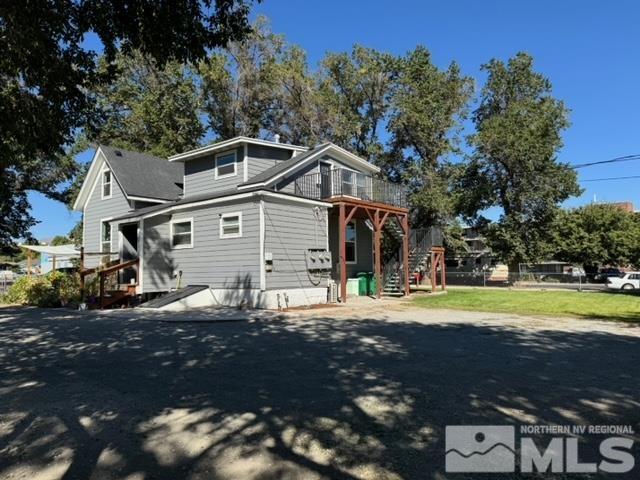 606 East 7th Street Reno, NV 89512 - Photo 7 of 35 a front view of a house with a yard