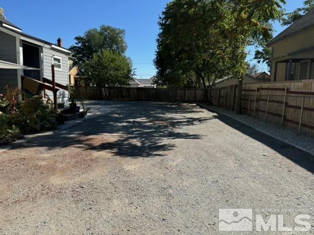 606 East 7th Street Reno, NV 89512 - Photo 8 of 35 a view of a yard with wooden fence