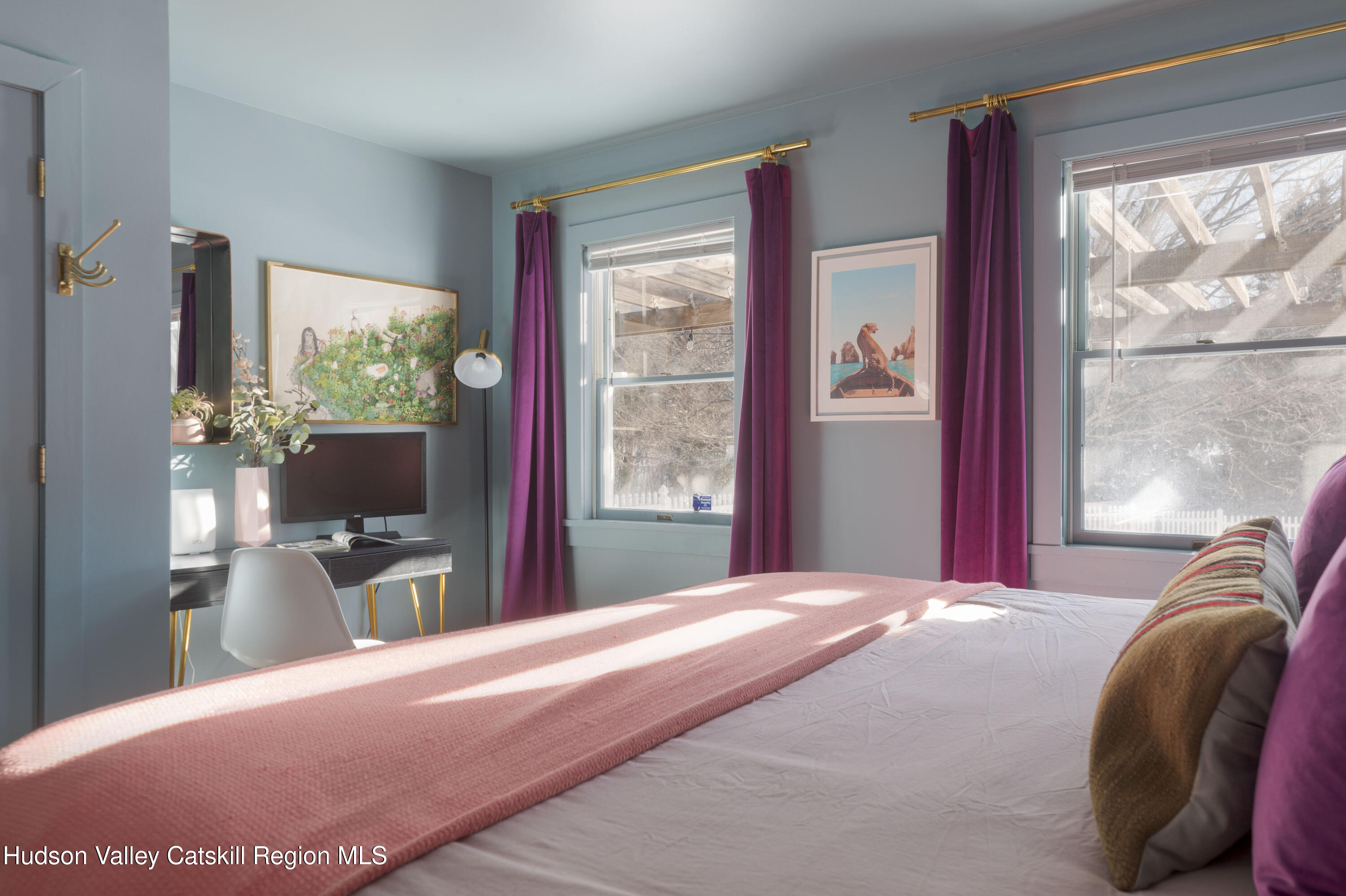 89 Cartwright Road Prattsville, NY 12468 - Photo 23 of 44 a bedroom with a bed flat screen tv and a large window