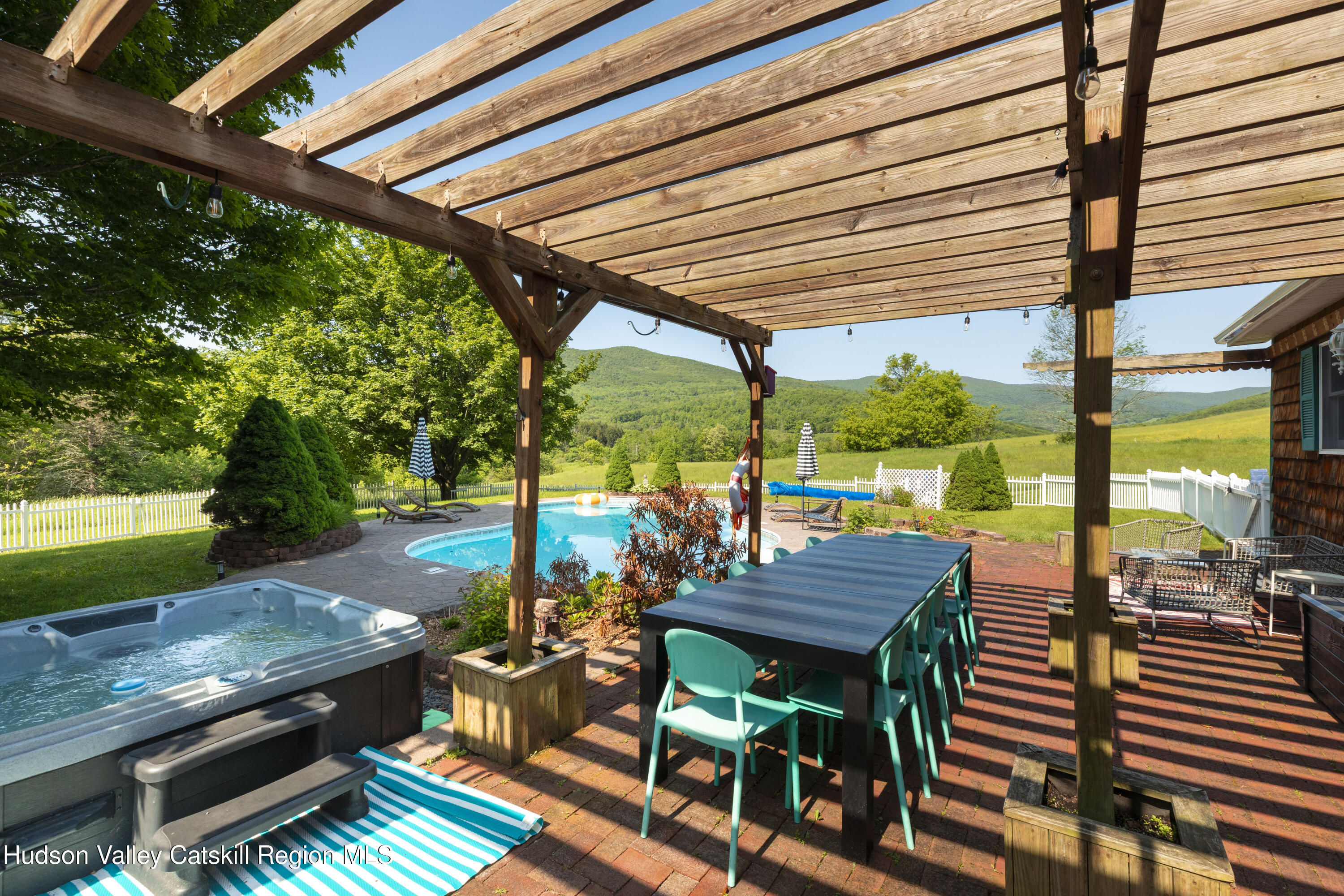 89 Cartwright Road Prattsville, NY 12468 - Photo 24 of 44 a view of a patio with table and chairs and a barbeque