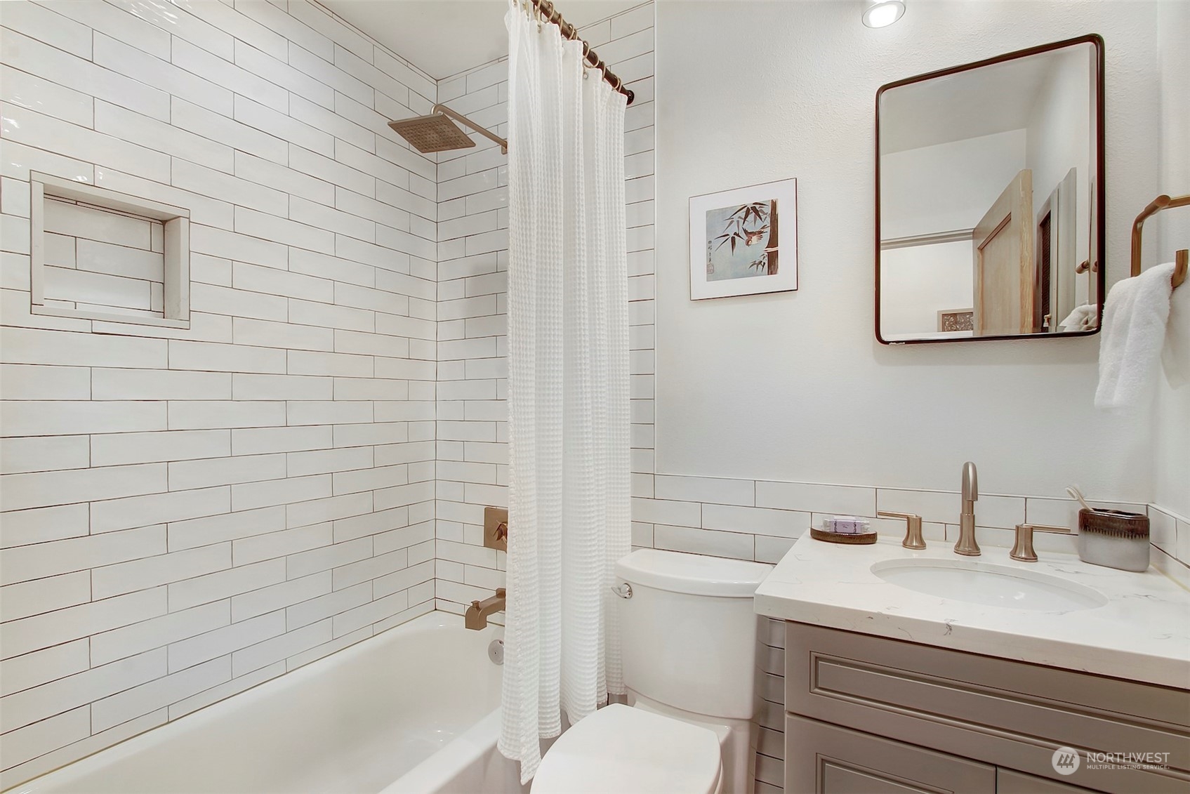 906 North 88th Street Seattle, WA 98103 - Photo 12 of 23 a bathroom with a sink a toilet and shower