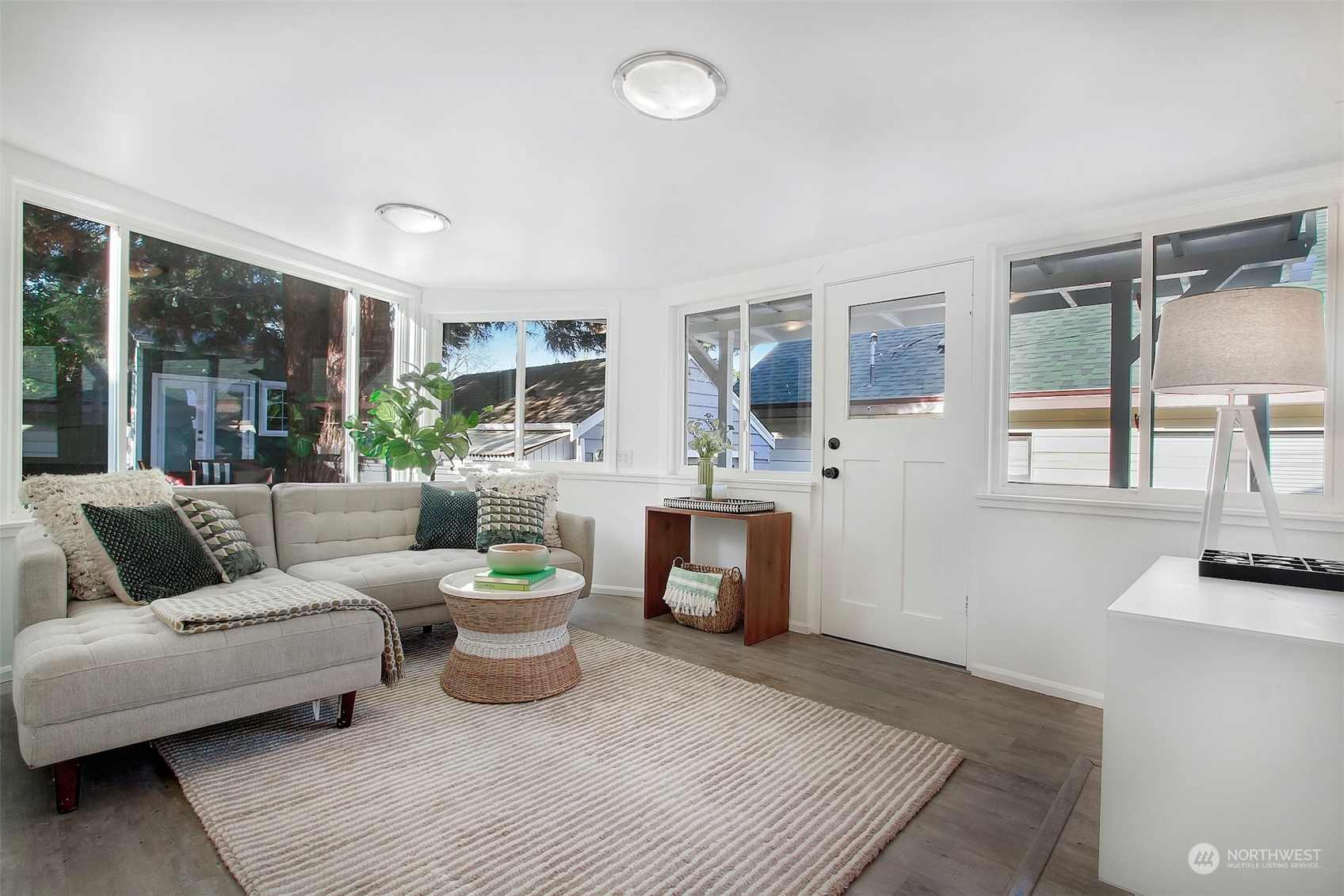 906 North 88th Street Seattle, WA 98103 - Photo 13 of 23 a living room with furniture and a table
