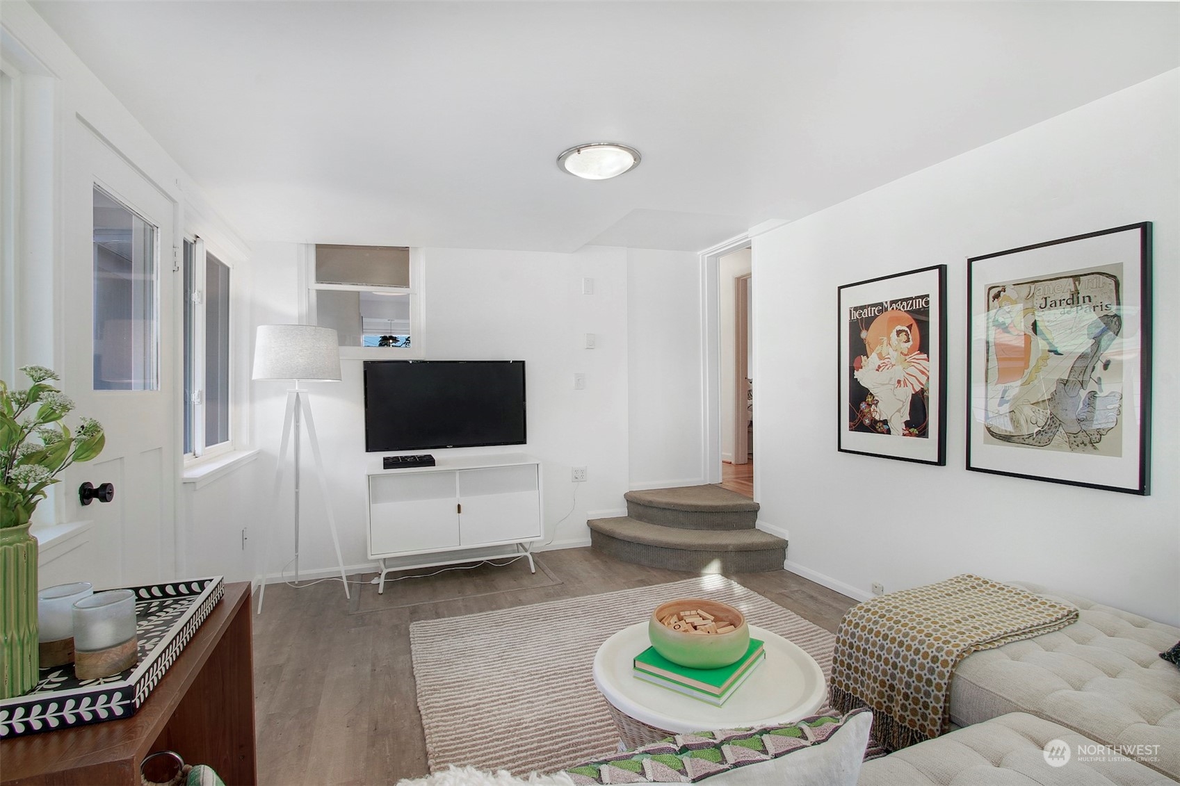 906 North 88th Street Seattle, WA 98103 - Photo 15 of 23 a living room with furniture and a flat screen tv