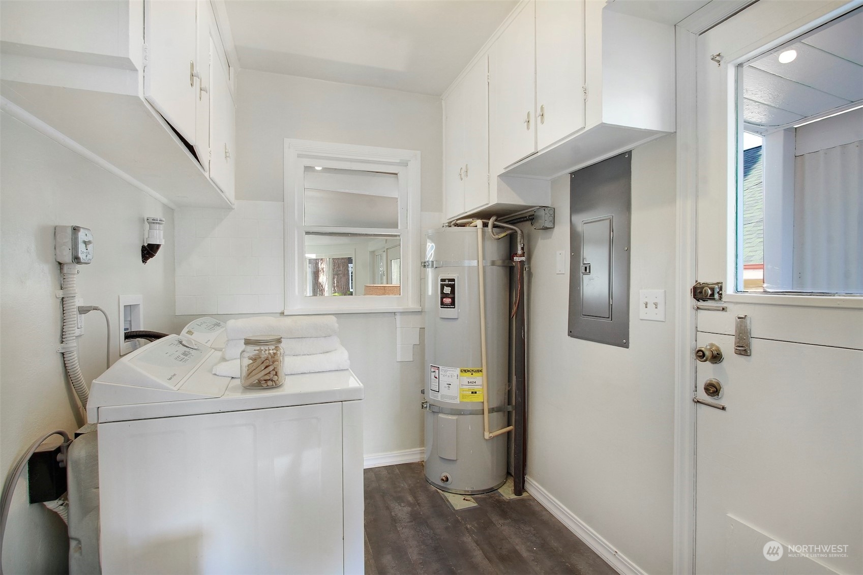906 North 88th Street Seattle, WA 98103 - Photo 16 of 23 a storage room with washer and dryer