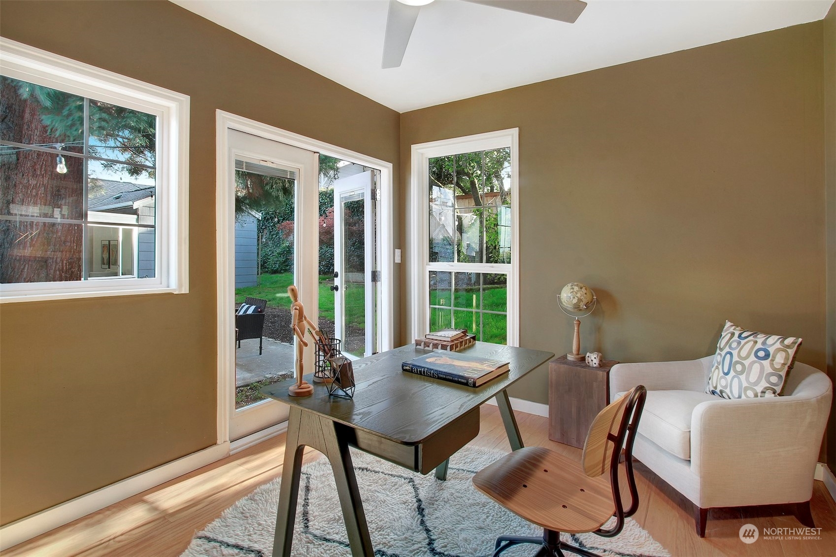 906 North 88th Street Seattle, WA 98103 - Photo 19 of 23 a living room with furniture and a window