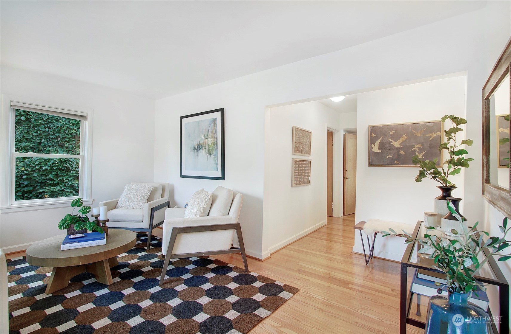 906 North 88th Street Seattle, WA 98103 - Photo 2 of 23 a living room with furniture and wooden floor