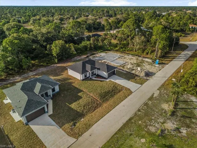a view of a couch in a backyard